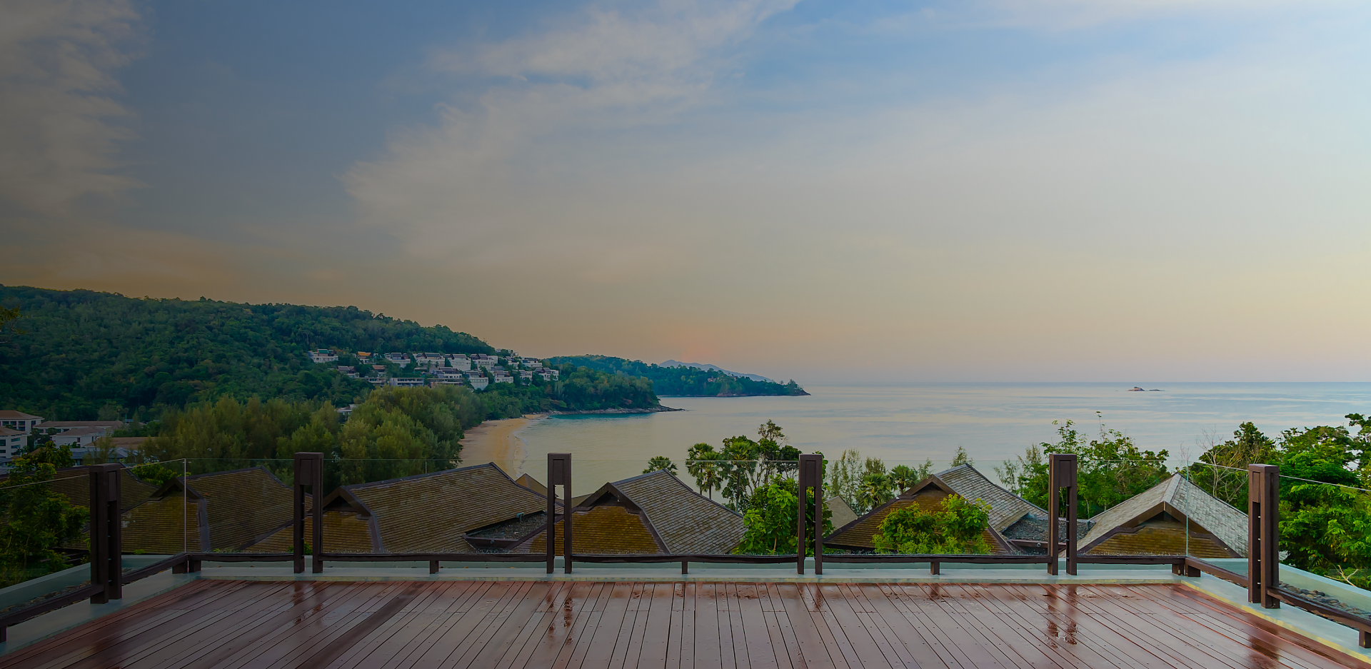 a view of the ocean from a balcony at The 